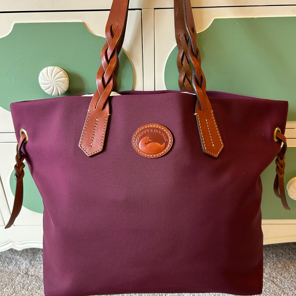 Dooney & Bourke tote bag with leather handles.